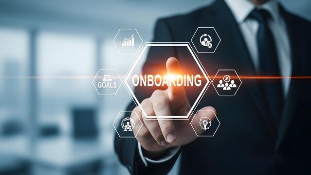 A businessman interacts with a digital interface displaying the word onboarding and various business icons indicating progress goals teamwork and direction - Powered by Adobe
