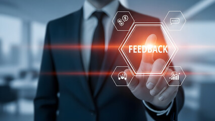 Businessman touching a hexagonal interface with the word feedback and surrounding icons representing business processes like communication data analysis and financial transactions