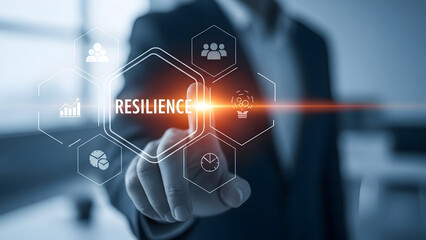 Business professional interacts with digital interface displaying resilience and icons for teamwork growth and time management