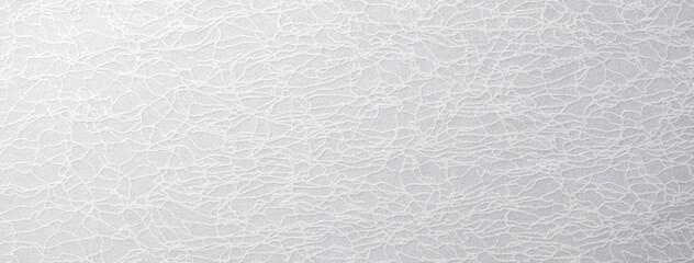 ひび割れ模様のある白い紙の背景テクスチャー