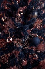 Decorated Christmas tree with copper ornaments