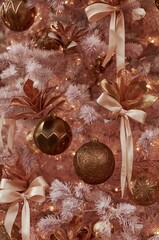 Pink Christmas Tree with Gold Ornaments and Ribbons