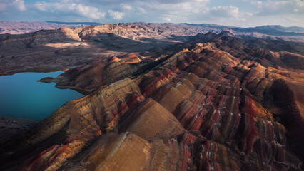 Rainbow mountains (hills) and salt lake in Georgia