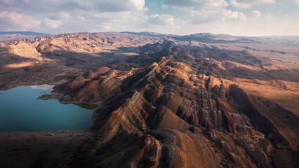 Rainbow mountains (hills) and salt lake in Georgia