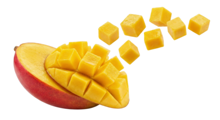 Fresh ripe mango half sliced revealing juicy yellow flesh cubes flying away against black background