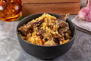 Traditional couscous with lamb and vegetables