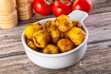 Baked small baby potato with herbs
