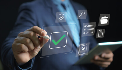 Digital checklist and approval concept. businessman selec virtual checkmark icon surrounded by security, documents, tasks, and verification symbols, emphasizing workflow management and productivity.
