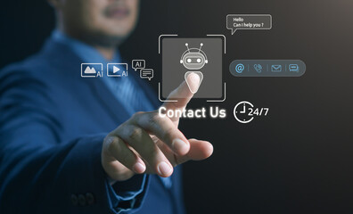 AI chatbot customer support concept. Businessman selecting a digital contact interface featuring virtual icons, communication channels, and 24/7 assistance, highlighting smart service and automation.