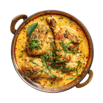 Delicious indian chicken korma served in a traditional copper pot isolated on transparent background