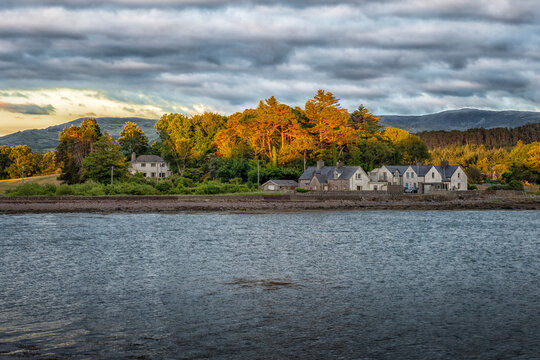 Waterbody With Houses in Background