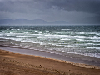 Surfers Riding Waves in the Ocean