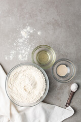 Overhead view of ingredients for making scallion pancake dough, process of making scallion pancakes