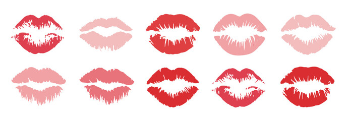 Abstract set of colorful lipstick prints and kiss marks in various red and pink shades