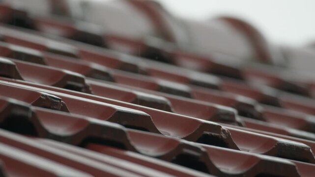 Rain on Red Ceramic Roof Tiles During Thunderstorm