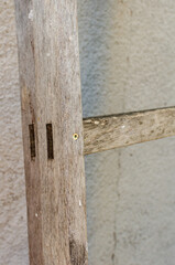 Old ladder leaning against the wall
