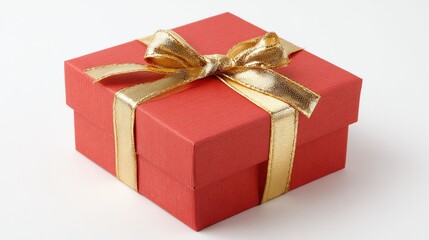 Obraz premium A red gift box with a gold bow, a Christmas present.
