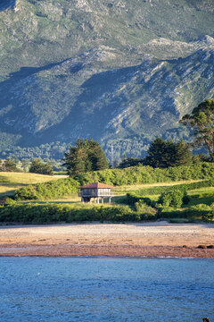 Traditional h&oacute;rreo building near beach and mountains in asturias