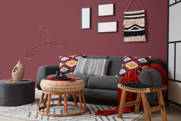 Asian tea set on table in stylish living room interior