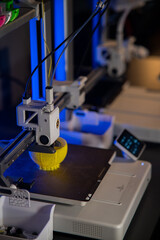 A student man print prototype on 3D printer