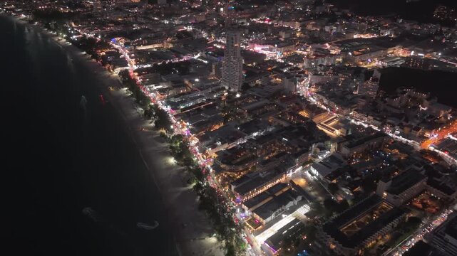 Drone shot of a sunset Patong in Phuket, Thailand at night