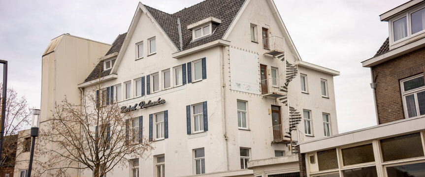 Historic city centre Dutch town Valkenburg, The Netherlands, street scene commerce and architecture tourist destination wide angle