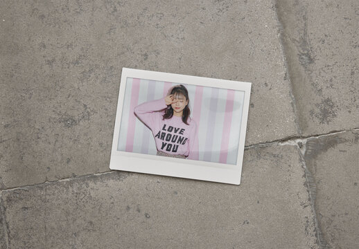 Mockup Of Customizable Instant Camera Photo