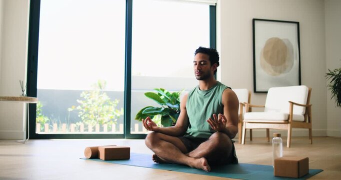 Home, yoga and man on floor, lotus and meditation with wellness, morning routine and calm. Apartment, yogi and person on mat, exercise and chakra with timelapse, zen or fitness with pilates and relax