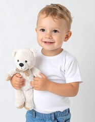 Smiling toddler holding teddy bear