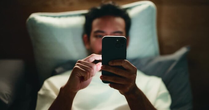 Phone, night and man in bedroom with insomnia, search and social media for relax with top view. Home, bed and sleepless person with mobile for notification, doom scroll and internet addiction above