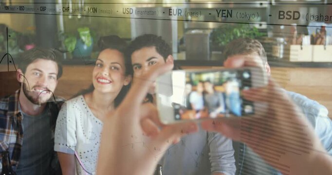 Off-camera hand raising phone to frame trio at cafe, taking portrait while finance chart overlaying