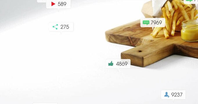 Badges popping top and floating down, board sliding in with burger, fries, jar, clustering likes