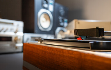 Close up on a vinyl record playing on a turntable
