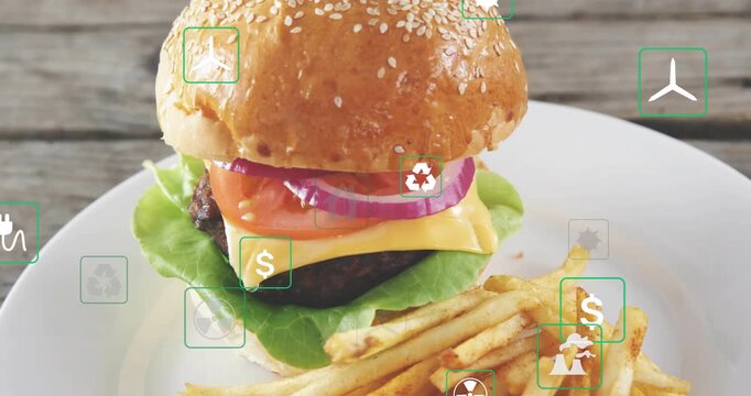 Green icons fading in from edges floating over sesame burger camera pulling back revealing eco cost