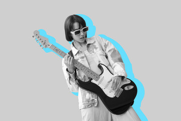 Cool young woman playing electric guitar on blue background