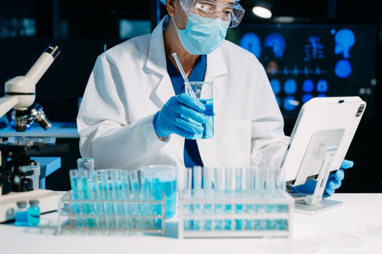 Scientist documenting research data in a modern laboratory, showcasing biotech innovation, medical research, diagnostics