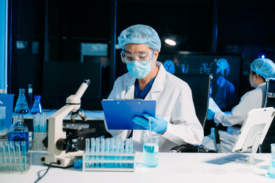 Scientist documenting research data in a modern laboratory, showcasing biotech innovation, medical research, diagnostics