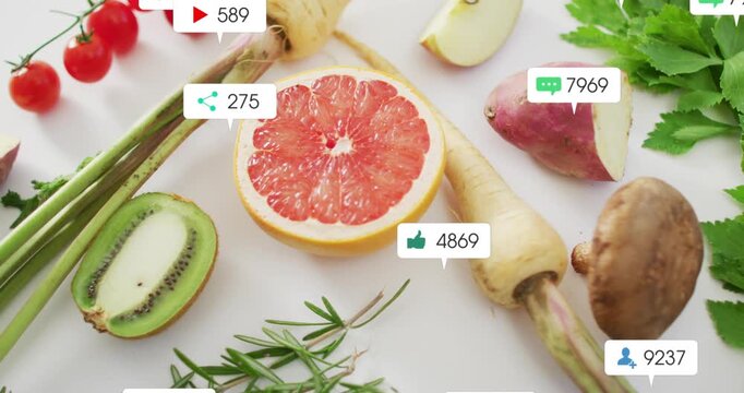 Halved grapefruit staying static while UI badges appearing, growing, clustering to show social buzz