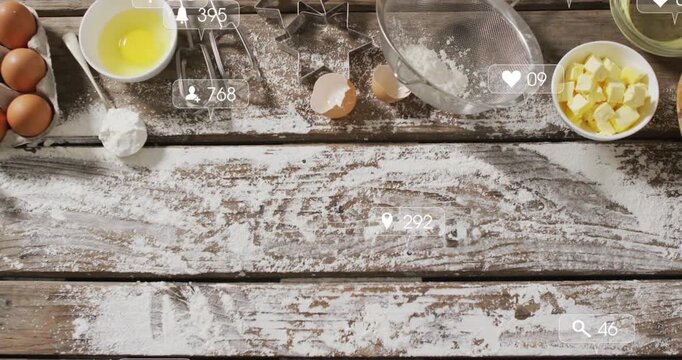 Social icons appearing after initial pause, floating over wooden baking setup, showing engagement