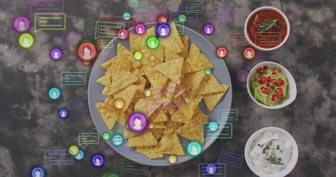 Icons appearing, round plate of corn chips staying centered, avatars orbiting, showing social buzz