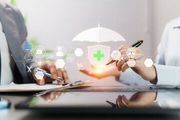 The health insurance concept involves female sales representatives reaching customers, recommending promotions, and providing real-time healthcare advice on a virtual holographic icon platform,