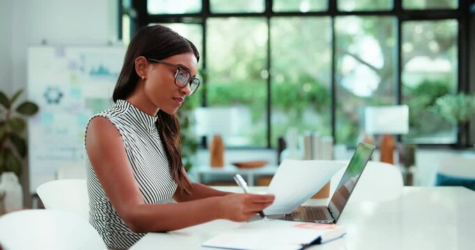 Laptop, documents and woman with typing for finance review, research and analytics. Office, tech and business person with glasses, graph and report for financial planning, audit or project budget