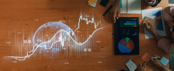 Vibrant office setting featuring charts and graphs illustrating financial growth, with a focus on...
