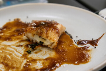 Last Piece of Sweet Dessert with Rich Caramel Sauce and Seeds