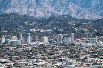 View of downtown Glendale and the San Gabriel Mountains.   Photo taken at Griffith Park in Los Angeles California.