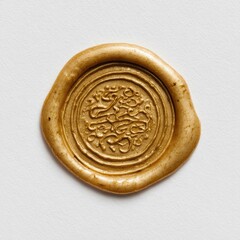 Close-up view of a gold wax seal with intricate raised circular design on white background