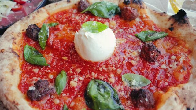 Delicious pizza with cheese mozzarella, meatballs, stracciatella burrata. Concept of italian food and cuisine. 