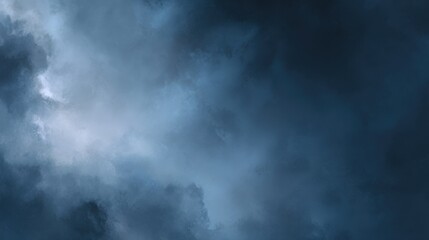 Obraz premium Dark and Mysterious Atmospheric Sky Background with Dramatic Cloud Formations in Shades of Deep Blue and Gray for Creative Projects and Design Purposes