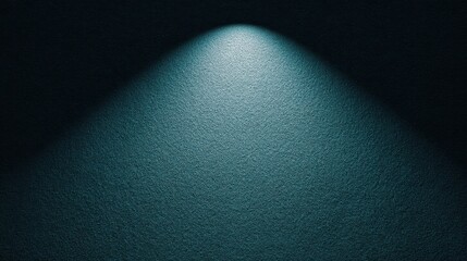 Soft Spotlight Illuminating a Textured Blue Surface on Dark Background, Creating a Calm and Tranquil Atmosphere for Design or Art Projects
