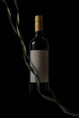 Dark Wine Bottle Mockup with Blank Label and Green Ribbon on Black Background for Product Presentation